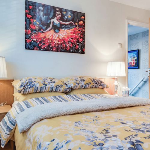 Bright and airy with a double bed, ideal for couples or solo travelers, with ample storage.