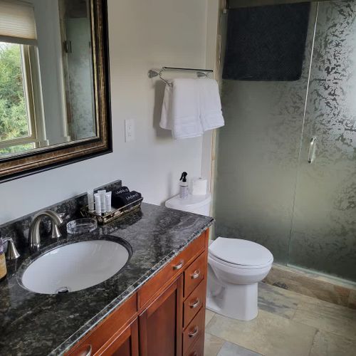 En suite bathroom to bedroom 1