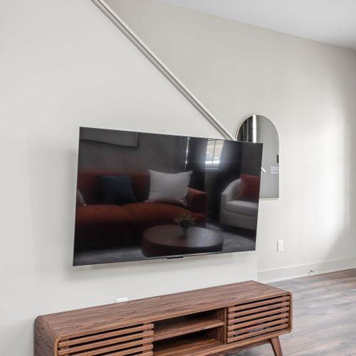 Plush seating, smart TV, and a cozy layout perfect for movie nights.