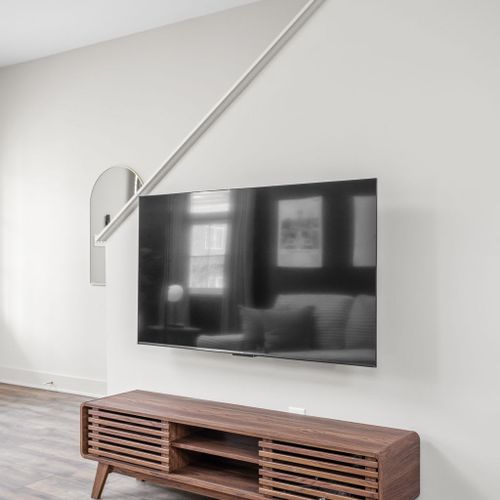 Plush seating, smart TV, and a cozy layout perfect for movie nights.