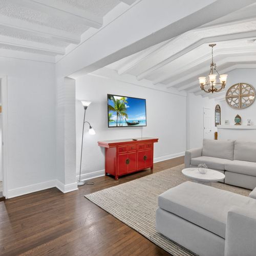 With its roomy layout and gorgeous Mediterranean accents, the living area is a delightful hub for entertainment.