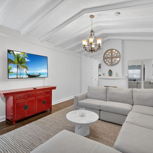 With its roomy layout and gorgeous Mediterranean accents, the living area is a delightful hub for entertainment.