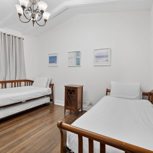 The third bedroom features two trundle beds, ideal for accommodating children or extra guests.