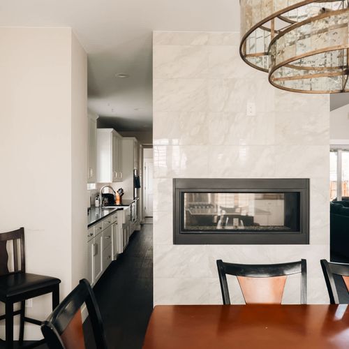 Dining area and double-sided gas fireplace