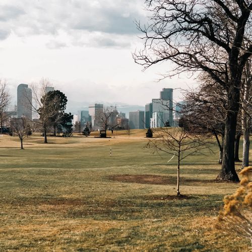 Views of the golf course, City Park, and Downtown Denver