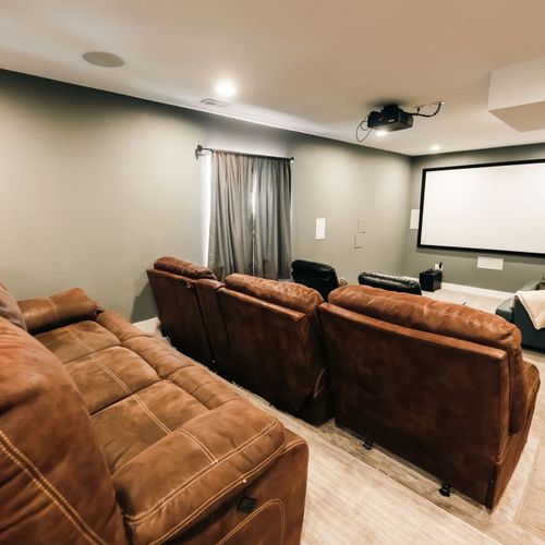 Basement theater area with 120" projector