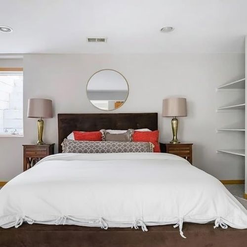 Basement bedroom with queen bed