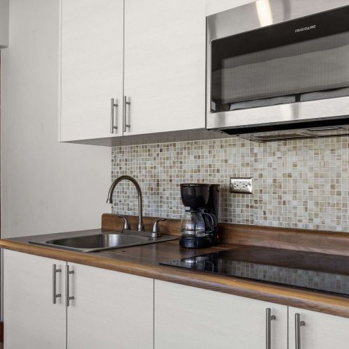 Kitchen sink and mosaic tiles