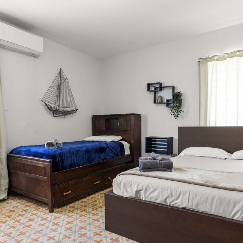 Twin beds in cozy bedroom