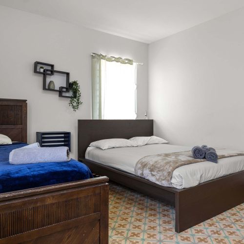 Bedroom view with white walls