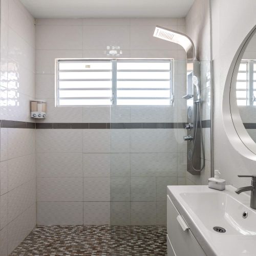 Tiled shower with glass door