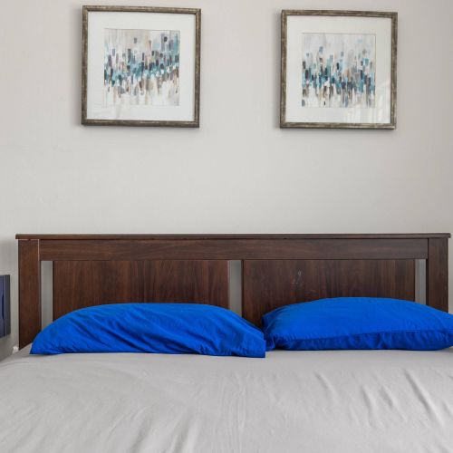 Close-up of pillows and art