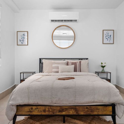 Serene, sun-drenched master bedroom