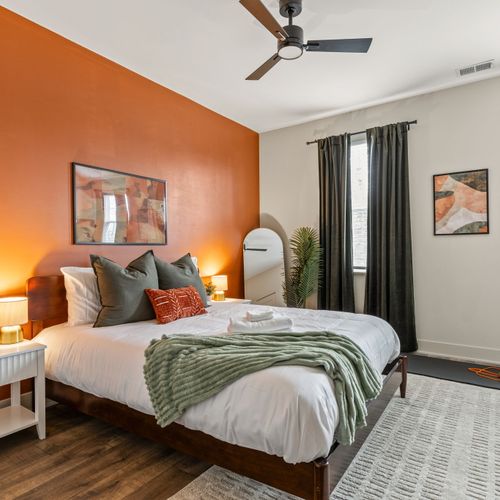 Bold wall, cozy bed, main character energy. Sleep like you mean it.