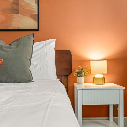 Golden hour vibes, even at bedtime. Cozy lighting and a mirror check before you hit the town.