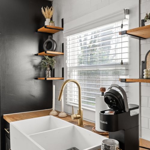 Bright, stylish kitchen details, farmhouse sink, open shelving, and coffee ready to go.