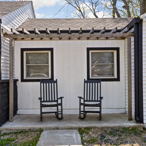 Front porch rocking chairs, because vacation starts outside.