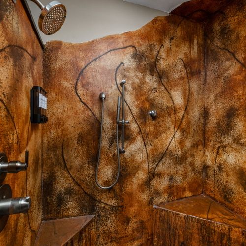 Ahhhh, nothing like a hot shower after a long day! Take a nice hot shower in the custom-built shower, featuring seating and a nice rainfall shower head!