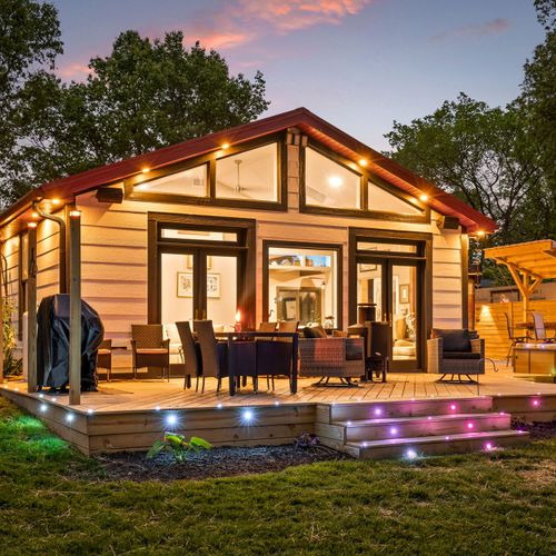 The deck that does it all — dine, lounge, soak, repeat.