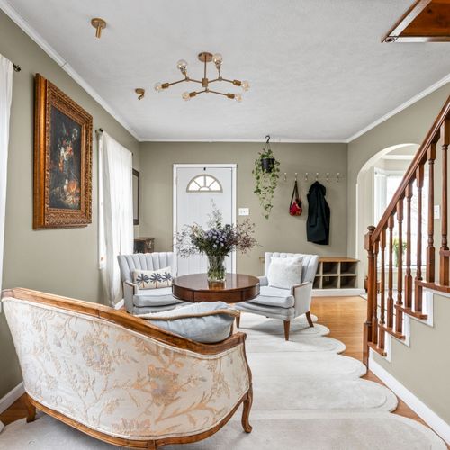 Bright, open living room flowing seamlessly into the rest of the home for easy gathering.