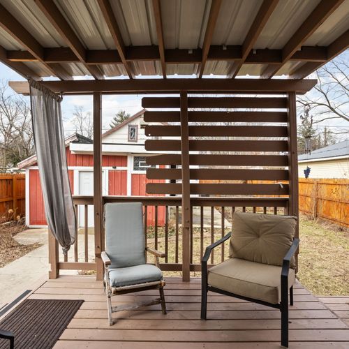Step outside to your private covered deck — perfect for enjoying morning coffee or evening drinks.