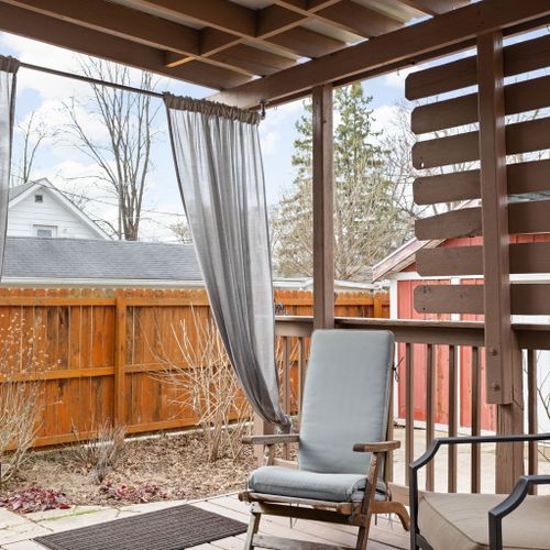 Step outside to your private covered deck — perfect for enjoying morning coffee or evening drinks.