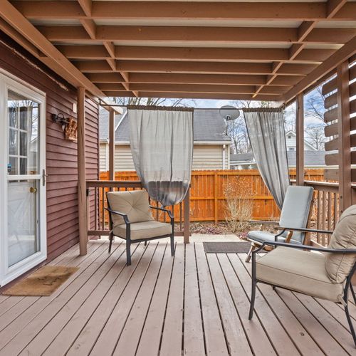 Step outside to your private covered deck — perfect for enjoying morning coffee or evening drinks.