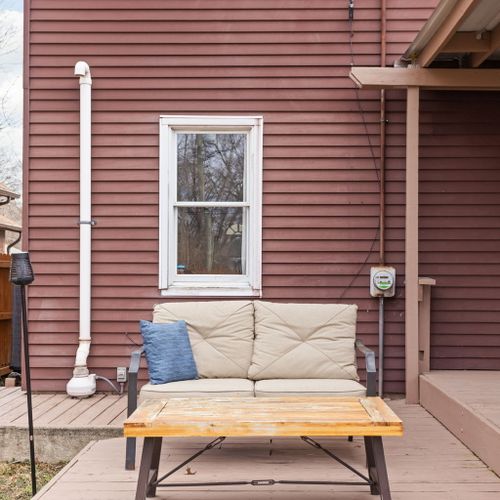 Step outside to your private covered deck — perfect for enjoying morning coffee or evening drinks.