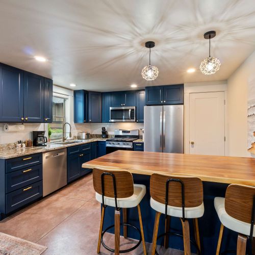 A bright kitchen and dining space designed for shared meals and connection.
