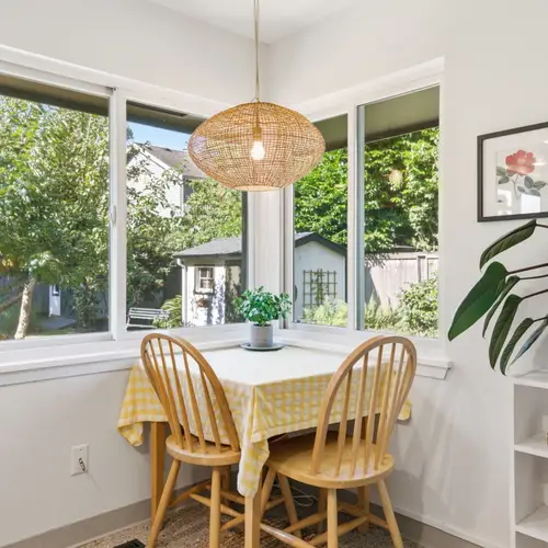 Sunny corner ideal for breakfast or planning your day's adventures.