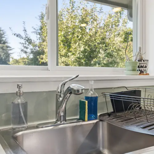 Clean sink area perfect for everyday use.
