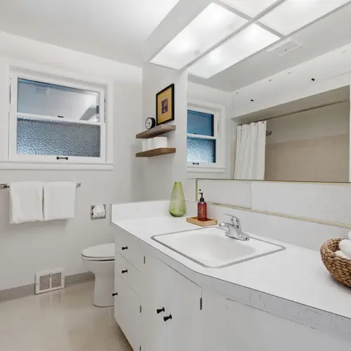 Refresh and recharge in the spacious bathroom.