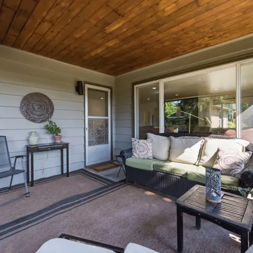 Cozy outdoor seating area perfect for relaxing any time of day.