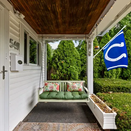 Front porch energy for coffee, cocktails, or people-watching