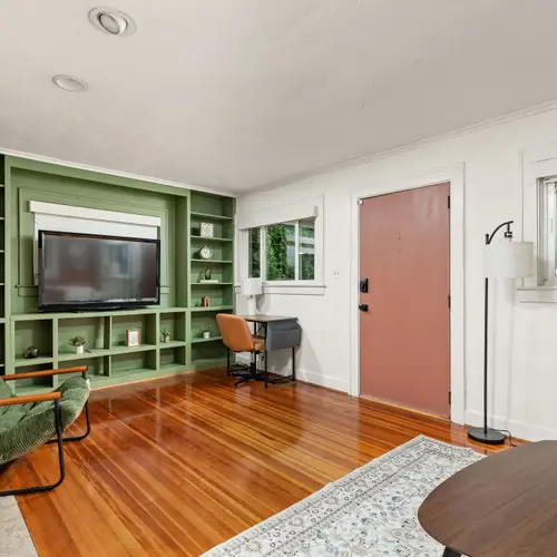 Built-ins, desk space, and a TV wall with actual personality