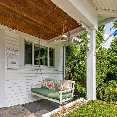 Front porch energy for coffee, cocktails, or people-watching