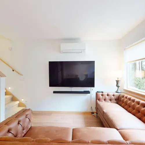A cozy spot for morning coffee, movie nights, and easy evenings together.