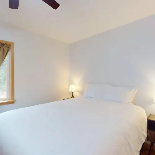 A comfortable queen bedroom designed for restful nights.