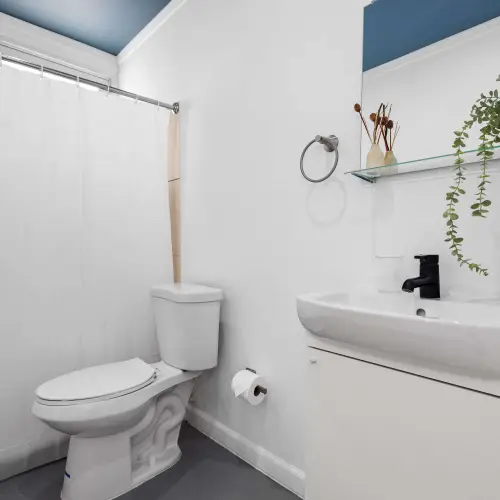 Clean full bathroom with shower & modern vanity