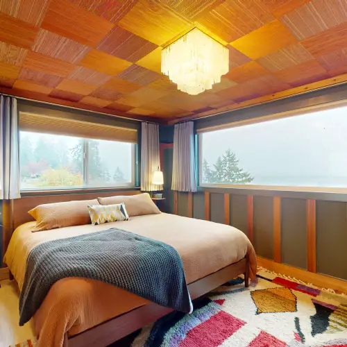 Retreat to the comfortable primary bedroom with a king bed.