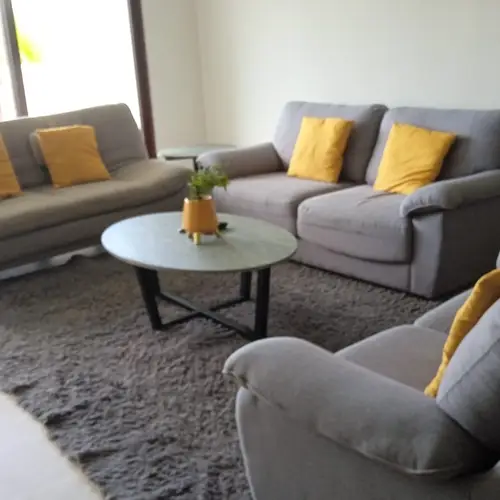 Living room with comfy sofas and a relaxed coastal feel