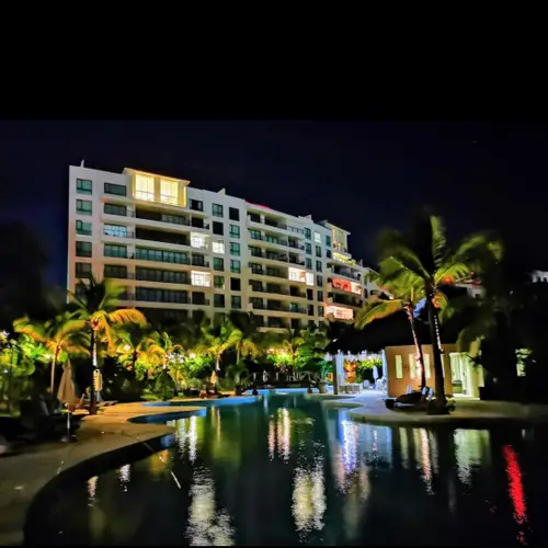 The resort pools lit up at night