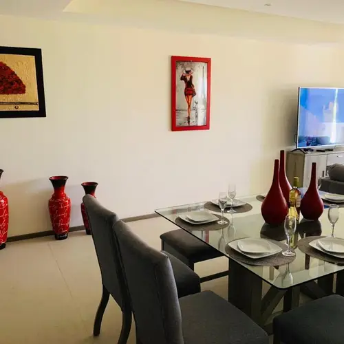 Dining area for 6 with smart TV nearby