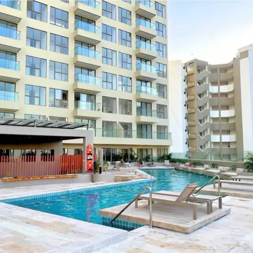 Main pool surrounded by sun loungers