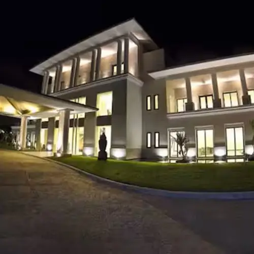 Resort clubhouse lit up at night
