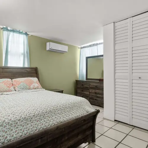 Bedroom 2 with queen bed and closet