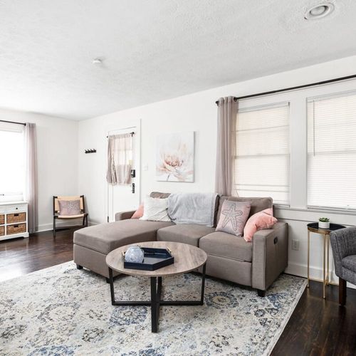 Living Room: Bright and inviting space featuring plush seating and charming decor—perfect for gatherings!