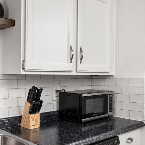 Kitchen: Whip up culinary delights with modern appliances and stylish design!