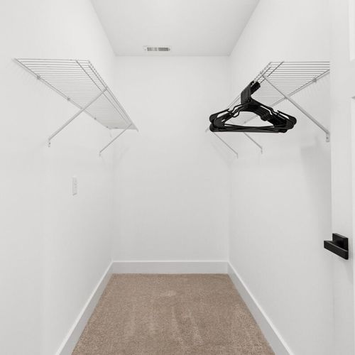 Spacious Walk-In Closet: Ample storage awaits for your wardrobe essentials and travel finds!