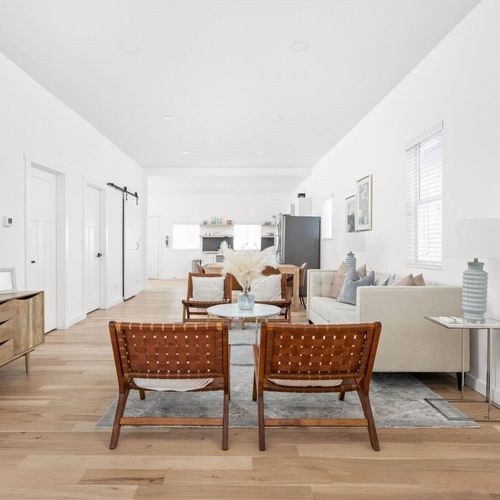 Living Room: Sleek design meets comfort with stylish seating and open views for perfect gatherings!
